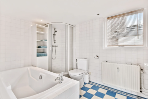bathroom with marble walls