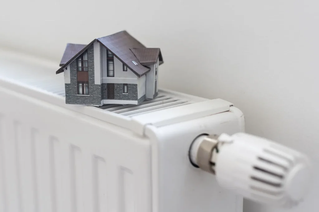 model of house on white radiator